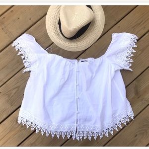 Gorgeous white top to pair with cutoffs!!
